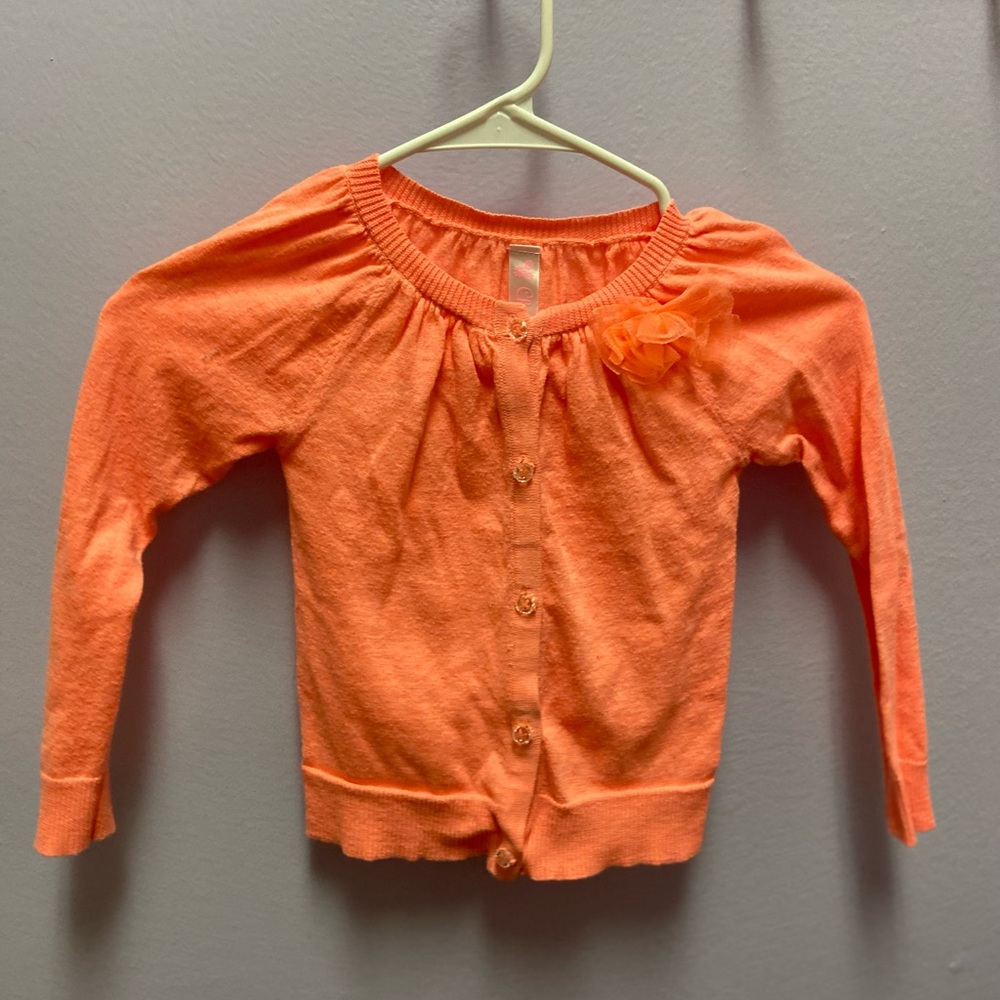Coral staple cardigan with flower